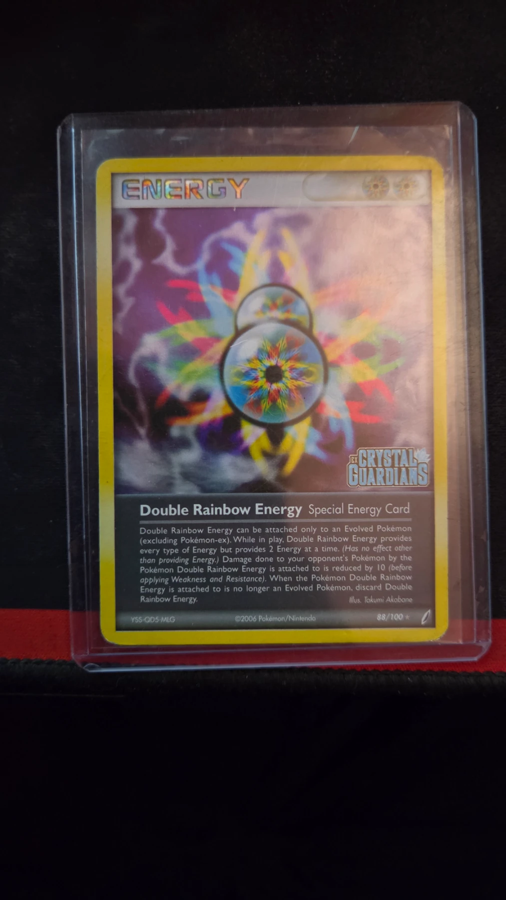 Double Rainbow Energy 088/100 Crystal Guardians front card photo in GradeValue pregrading report