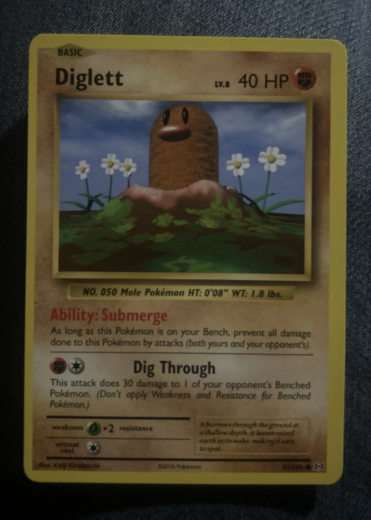 Diglett 055/108 Evolutions front card photo in GradeValue pregrading report