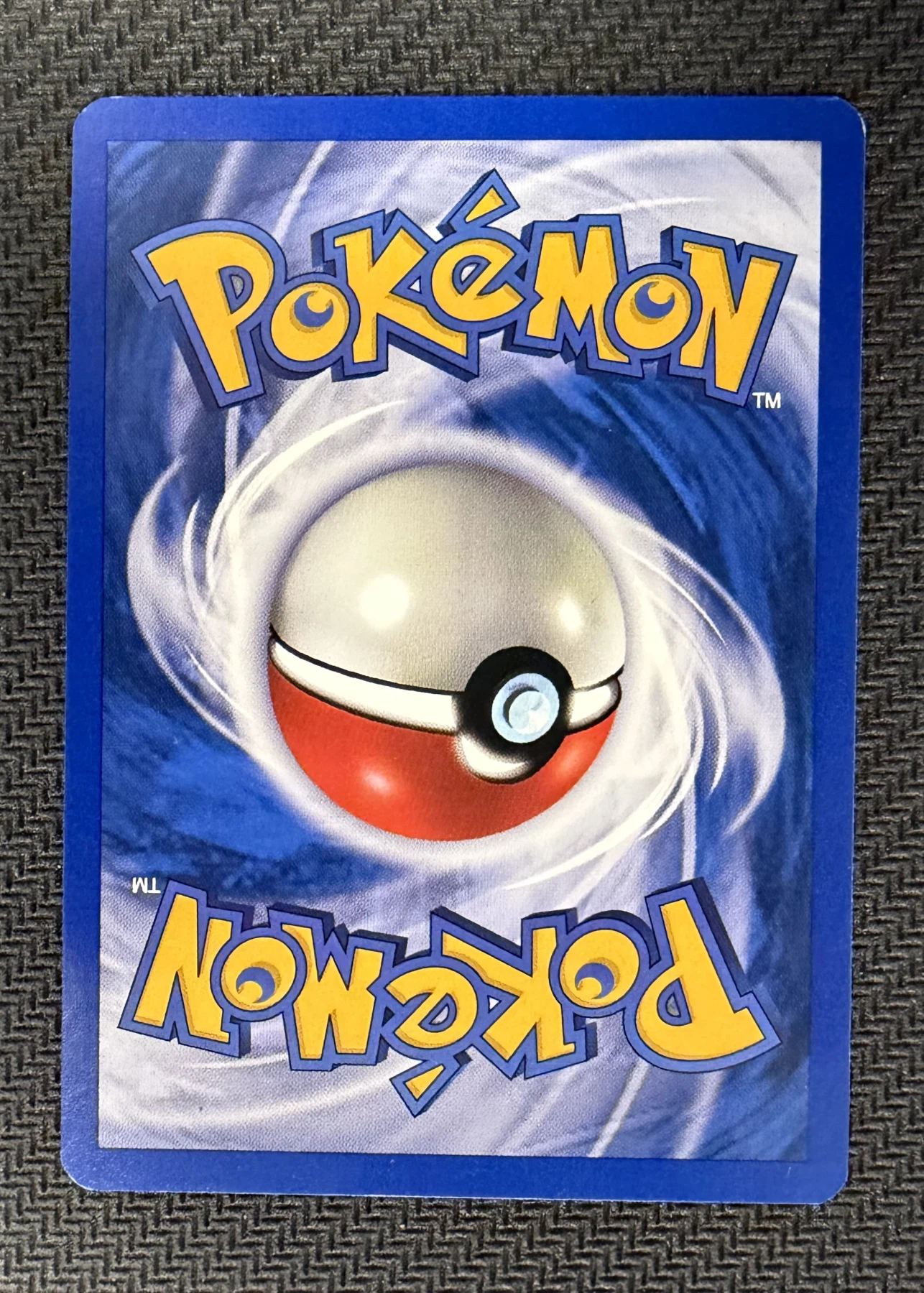 Mew 001/18 Southern Islands back card photo in GradeValue pregrading report