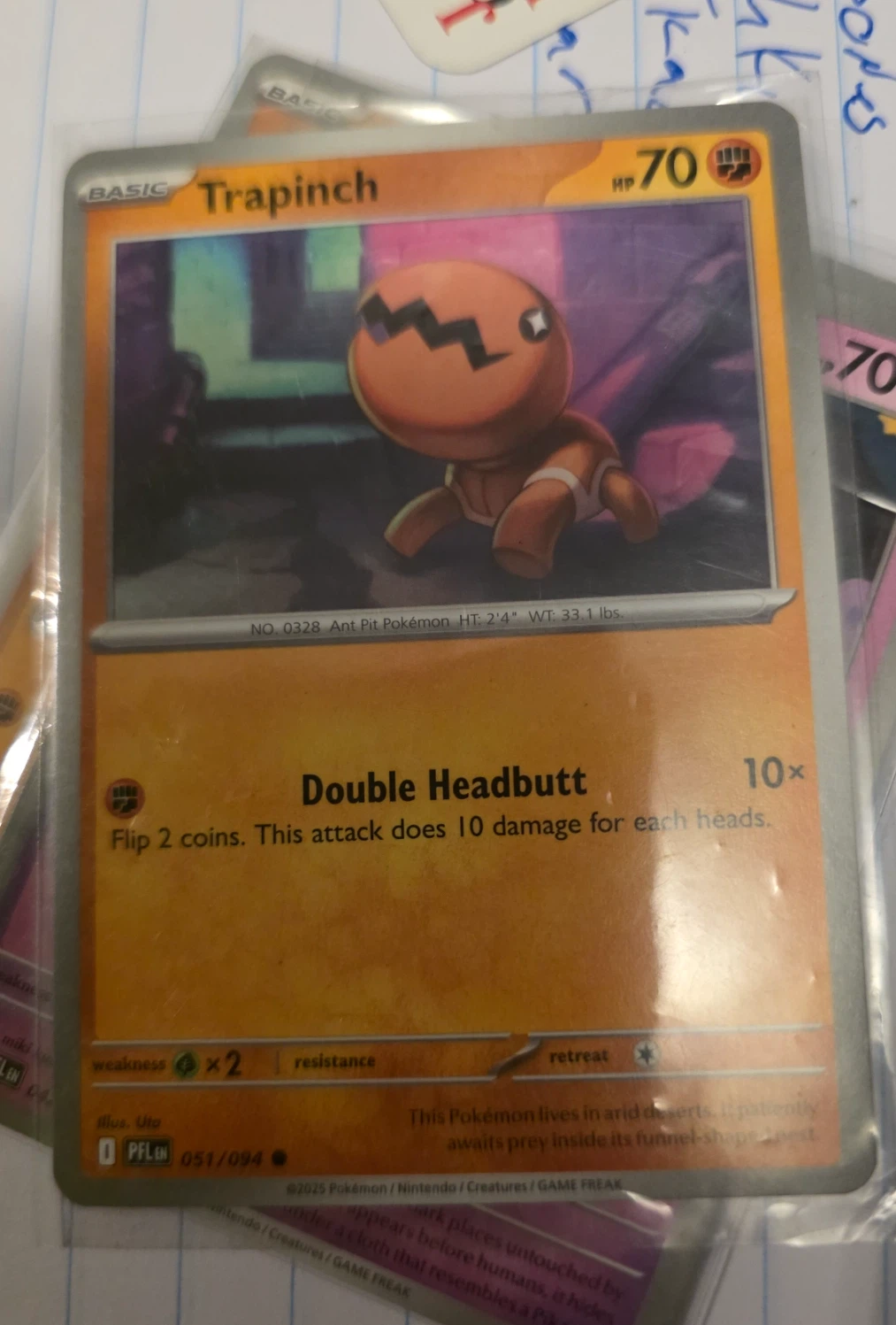 Trapinch 051/94 Phantasmal Flames front card photo in GradeValue pregrading report