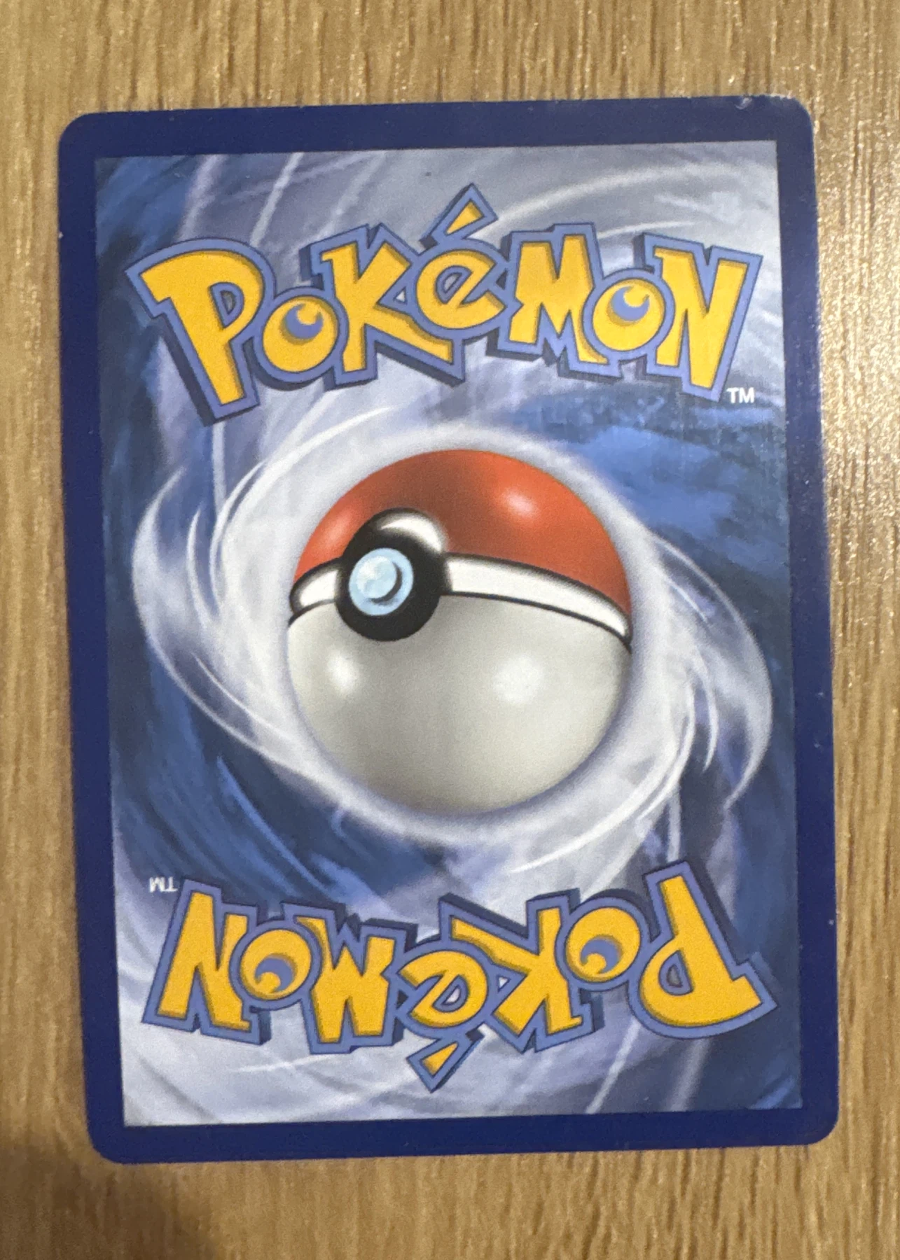 Rayquaza GX 177/168 Celestial Storm back card photo in GradeValue pregrading report