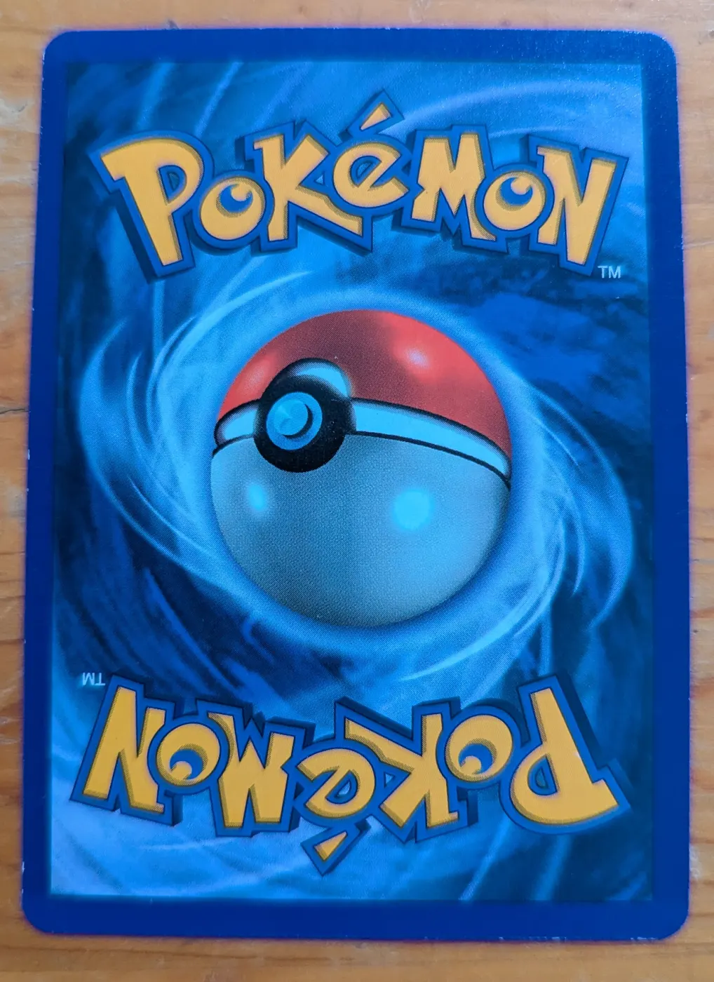 Charizard 004/102 Base Set back card photo in GradeValue pregrading report