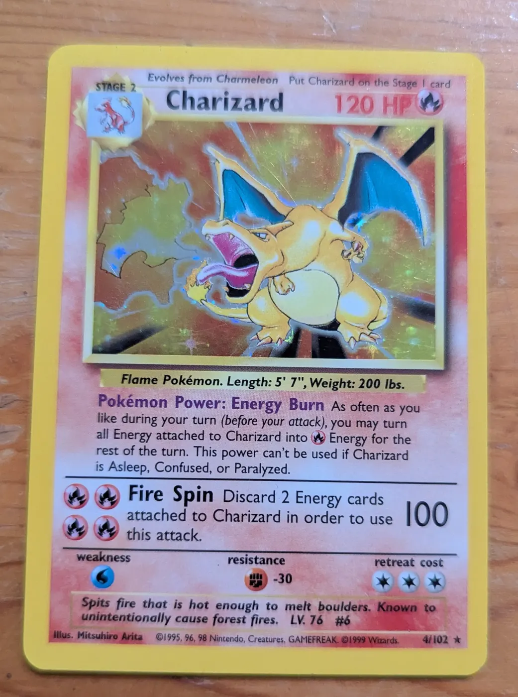 Charizard 004/102 Base Set front card photo in GradeValue pregrading report