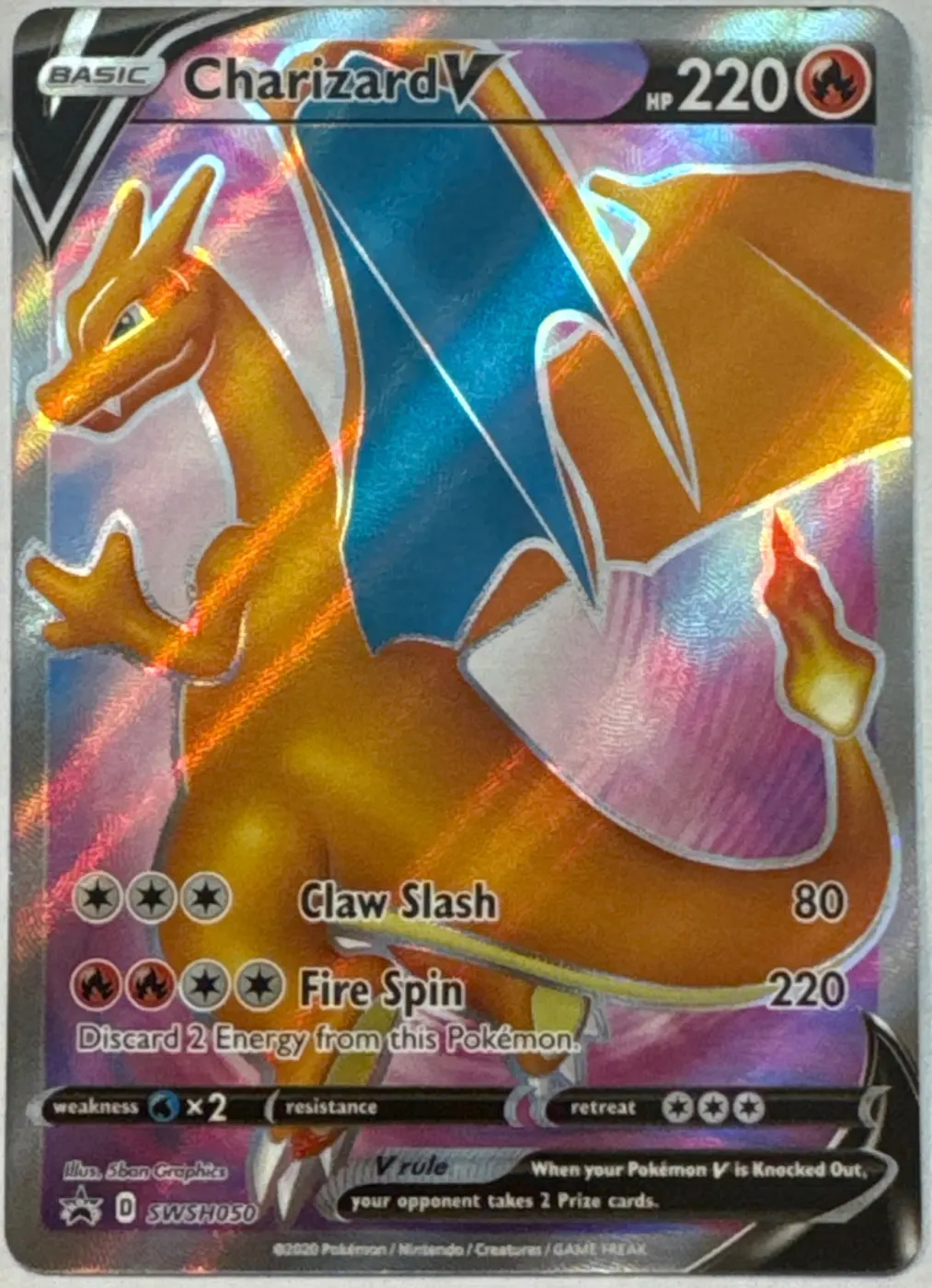 Charizard V SWSH050/307 SWSH Black Star Promos front card photo in GradeValue pregrading report