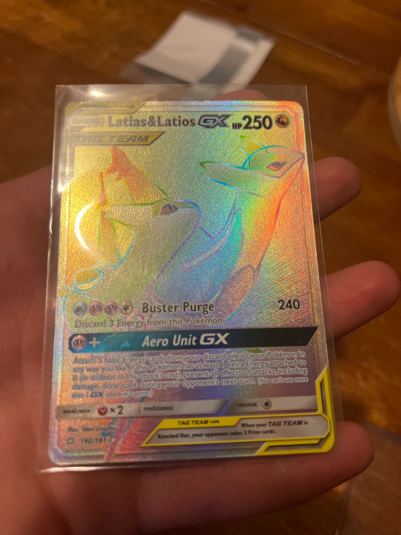 Latias & Latios GX 190/181 Team Up front card photo in GradeValue pregrading report