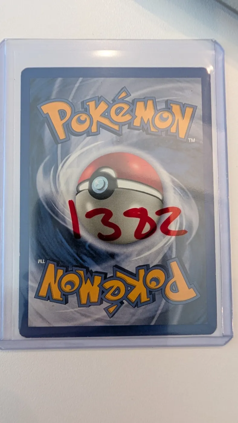 Shining Charizard 107/105 Neo Destiny back card photo in GradeValue pregrading report