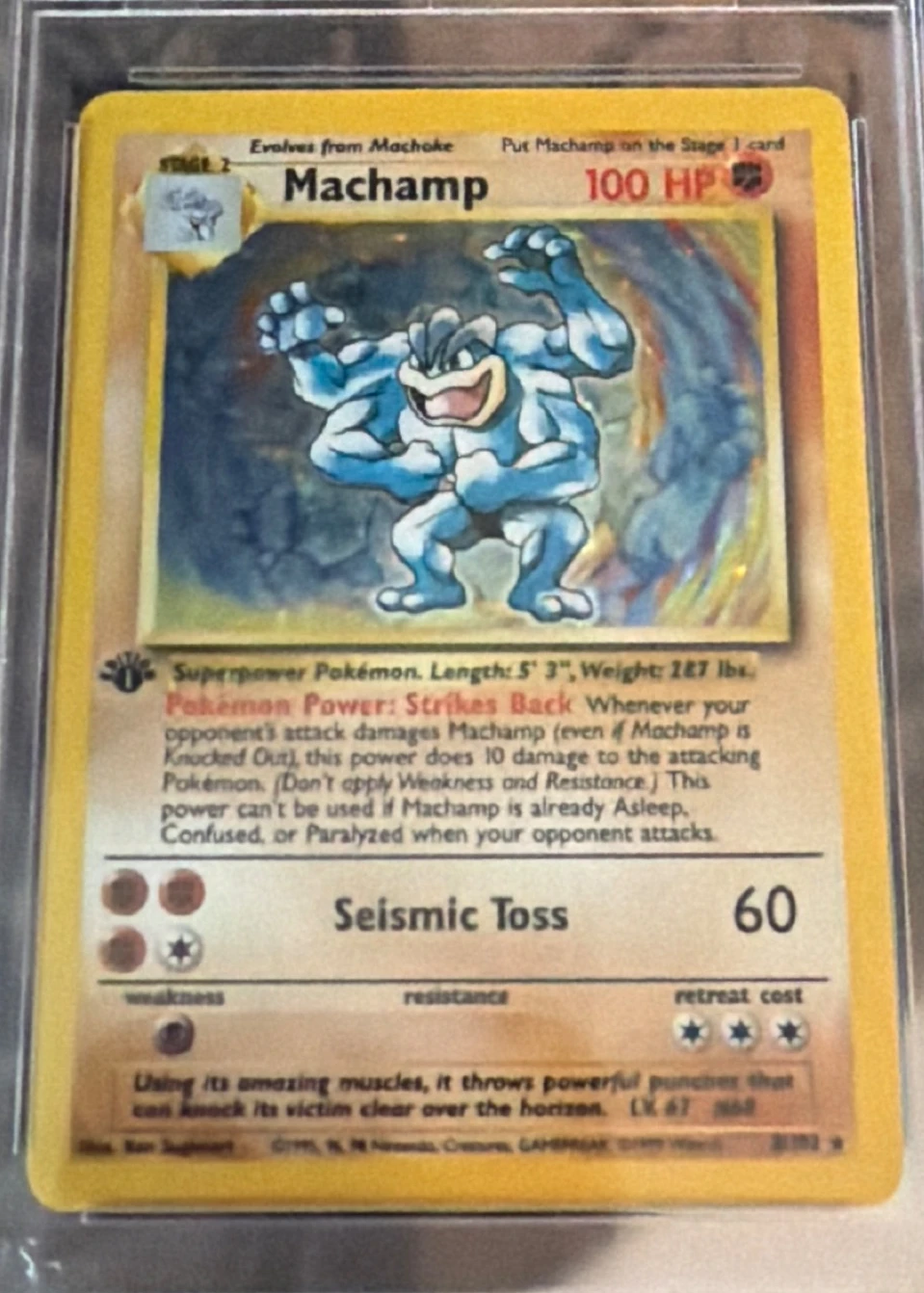 Machamp 008/102 Base Set front card photo in GradeValue pregrading report