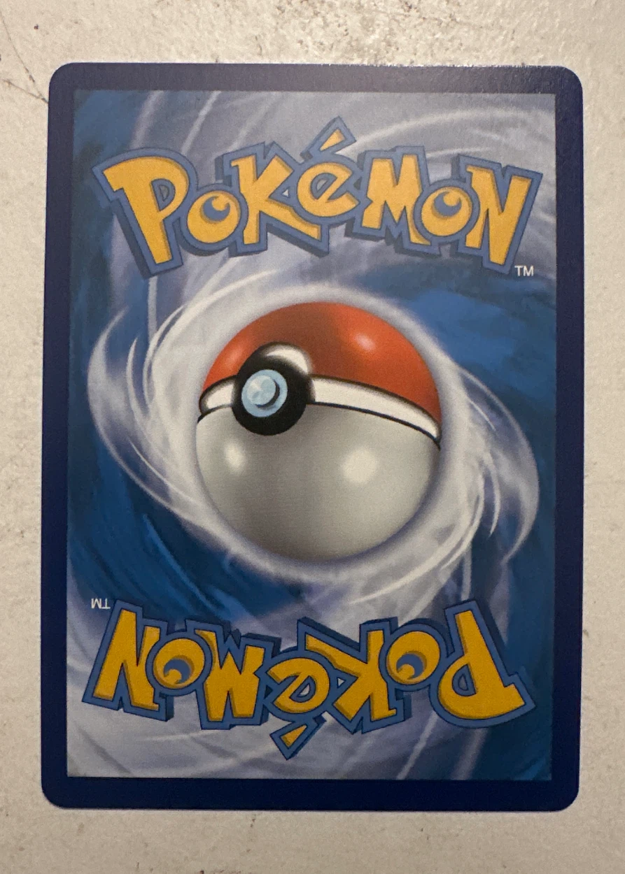 Surfing Pikachu V 008/25 Celebrations back card photo in GradeValue pregrading report
