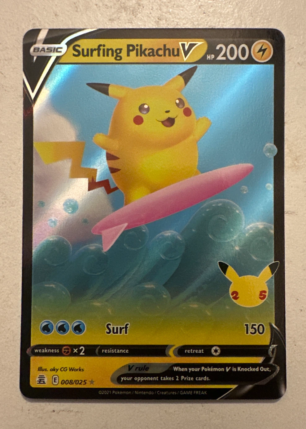 Surfing Pikachu V 008/25 Celebrations front card photo in GradeValue pregrading report