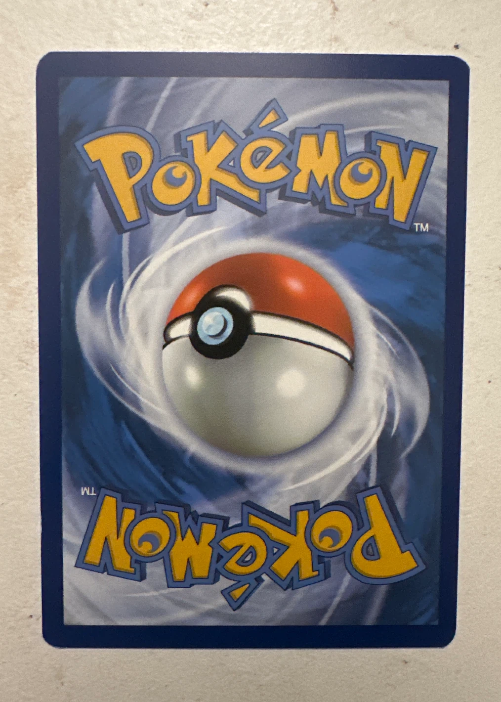 Eevee 125/203 Evolving Skies back card photo in GradeValue pregrading report