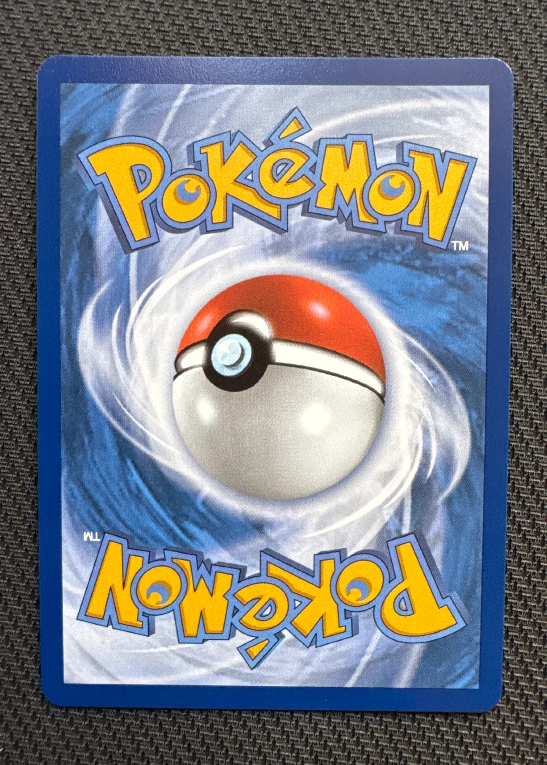 Hisuian Zorua 145/128 30th Celebration back card photo in GradeValue pregrading report