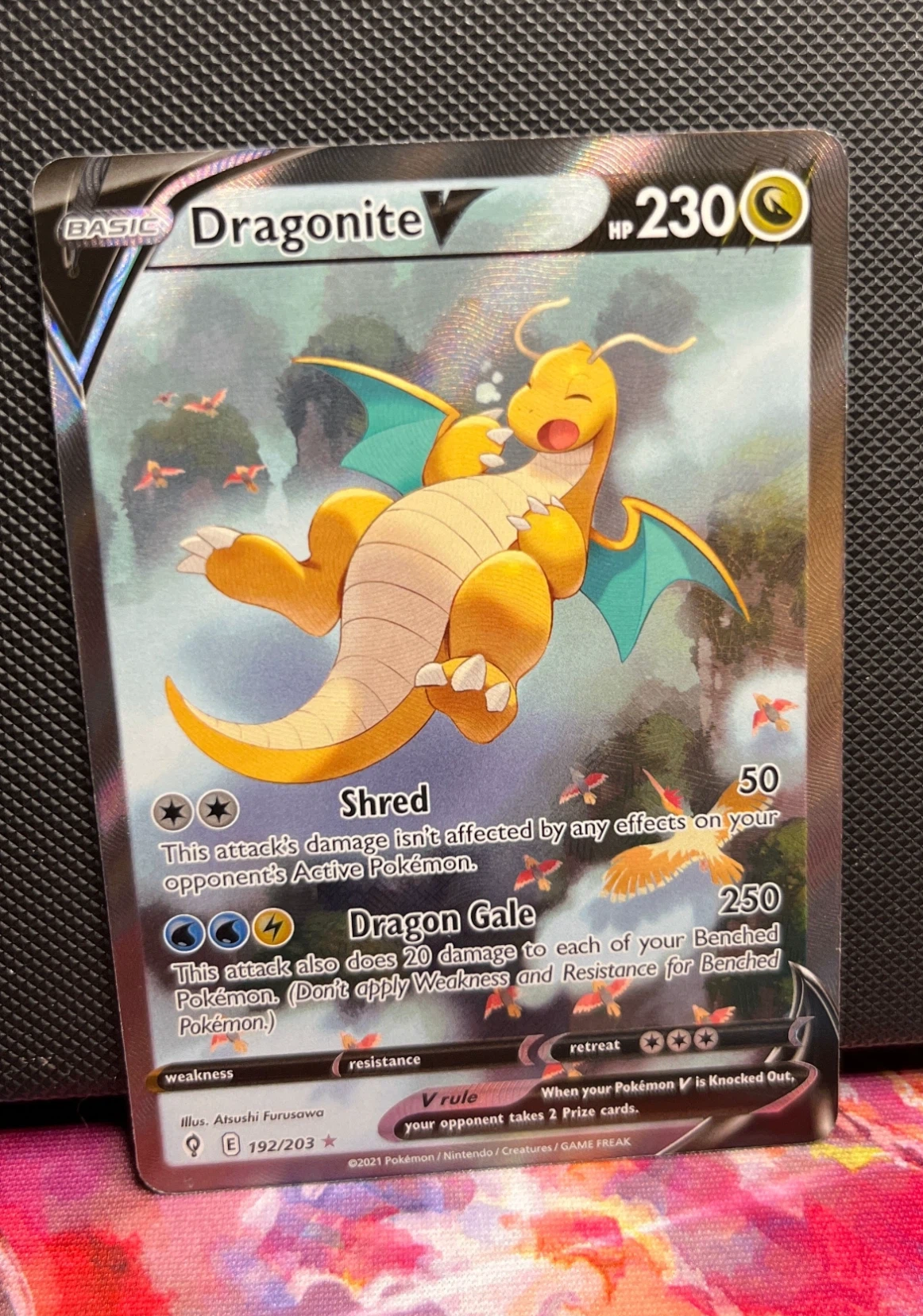 Dragonite V 192/203 Evolving Skies front card photo in GradeValue pregrading report