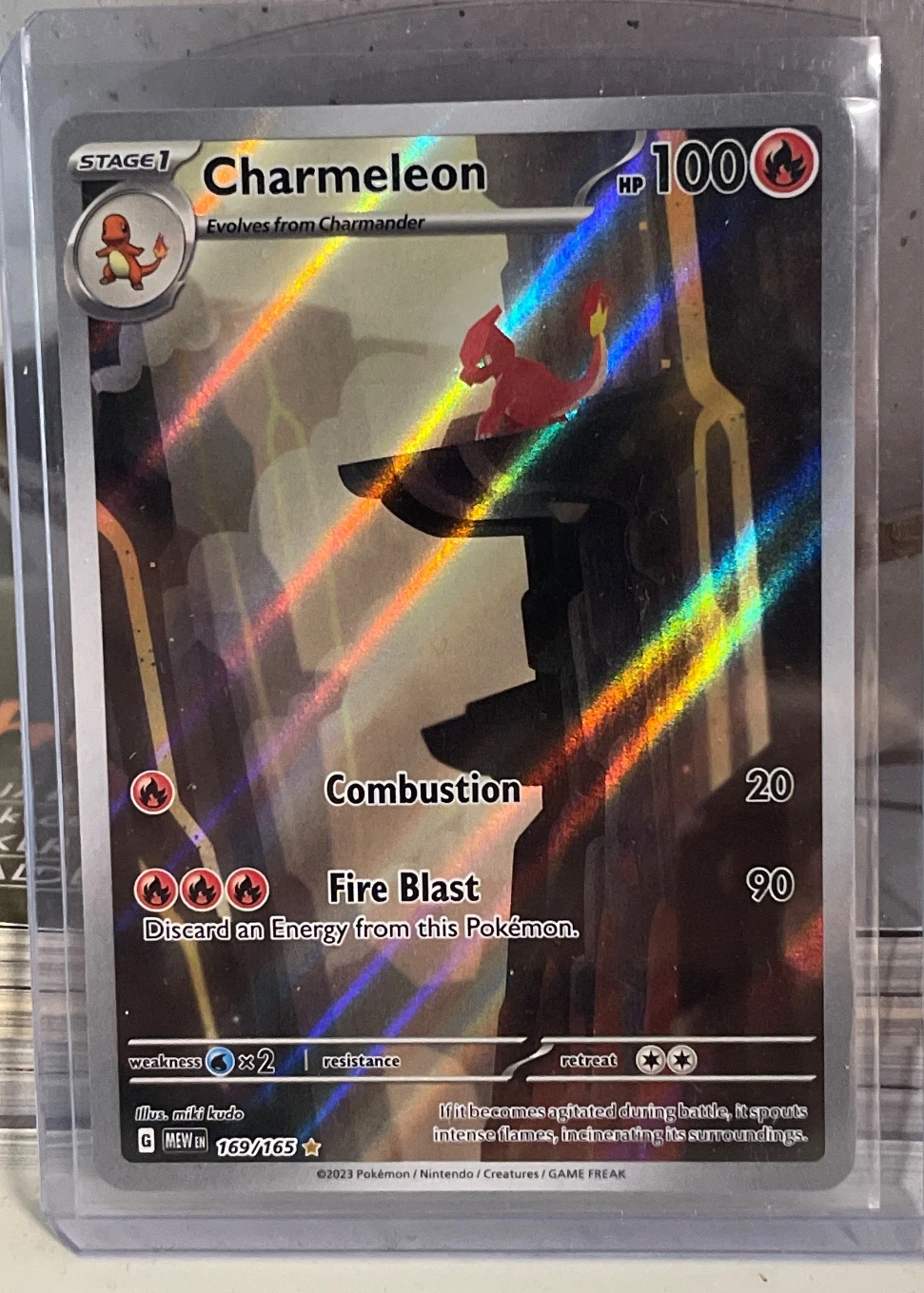 Charmeleon 169/165 151 front card photo in GradeValue pregrading report