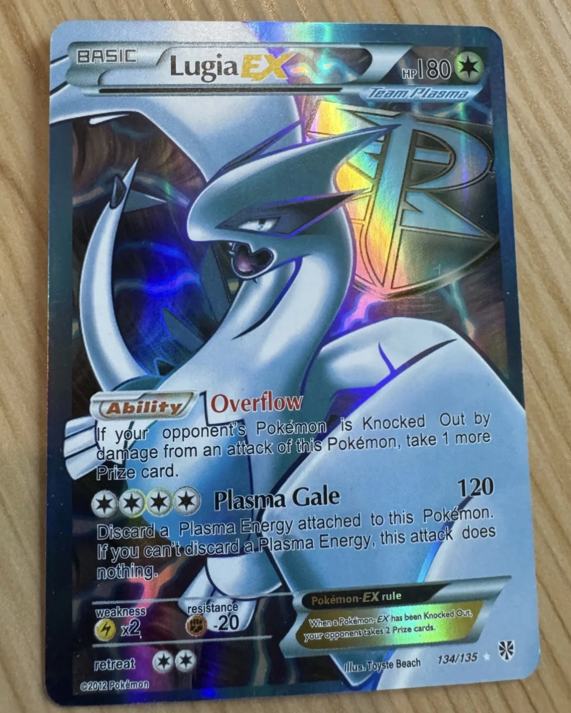 Lugia-EX 134/135 Plasma Storm front card photo in GradeValue pregrading report
