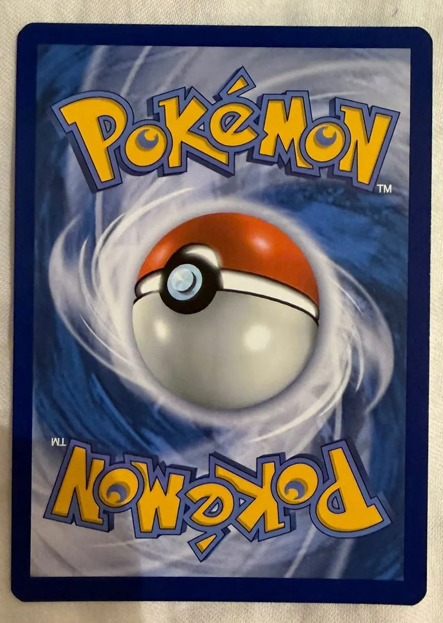 Morty's Conviction 211/162 Temporal Forces back card photo in GradeValue pregrading report