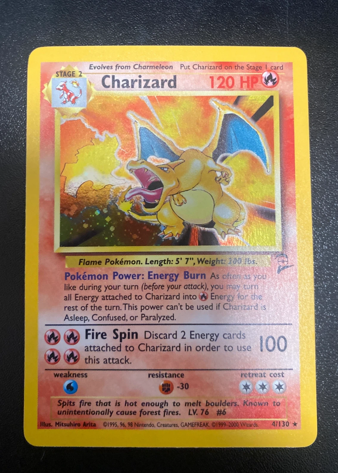 Charizard 004/130 Base Set 2 front card photo in GradeValue pregrading report