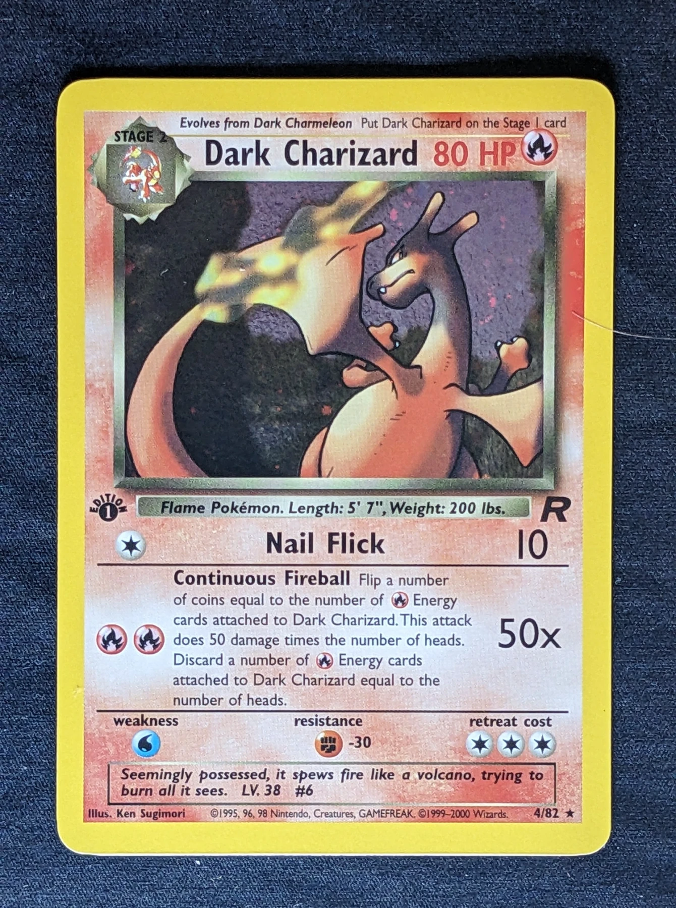 Dark Charizard 004/82 (First Edition Stamp) Team Rocket front card photo in GradeValue pregrading report