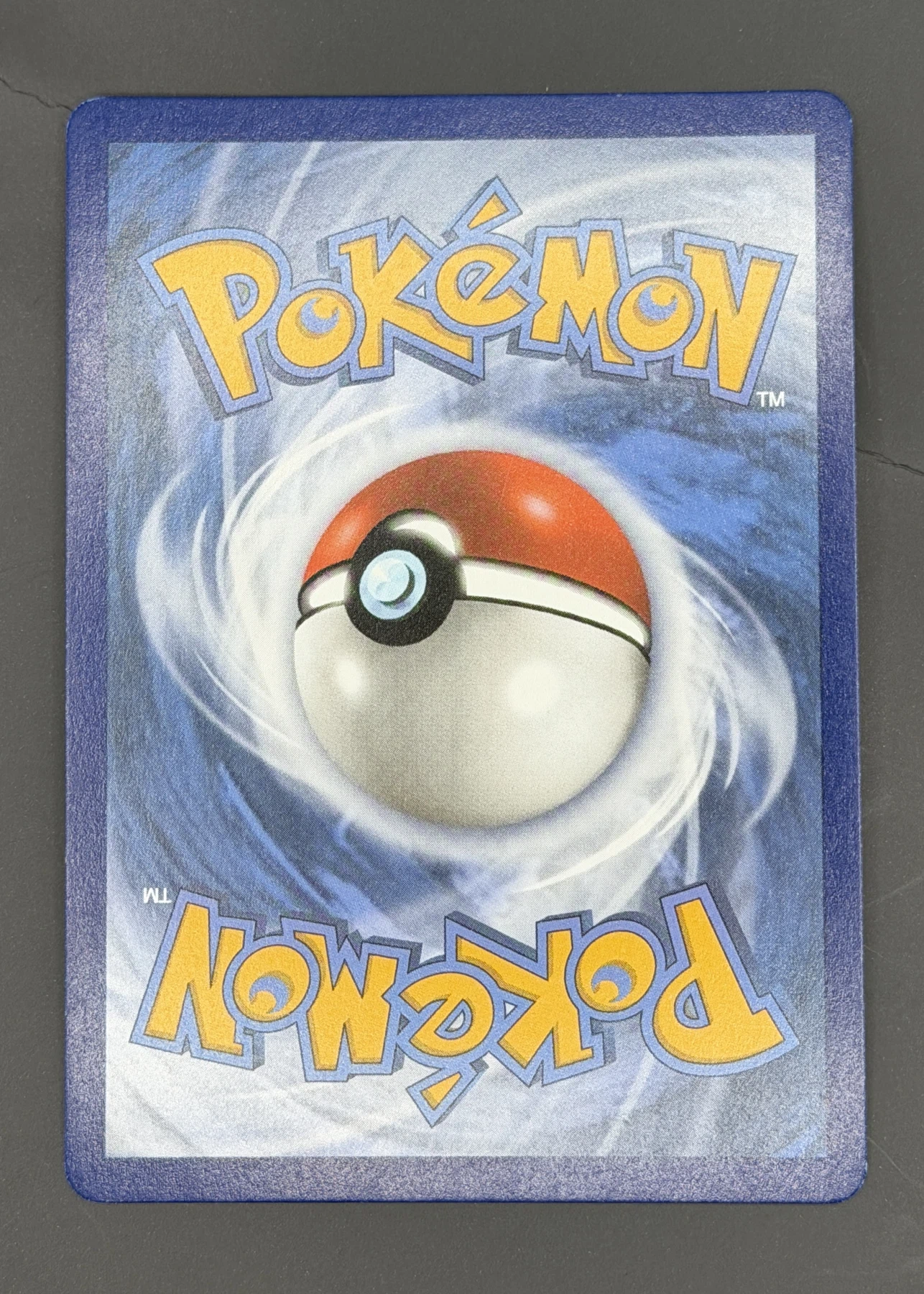 Umbreon VMAX 215/203 Evolving Skies back card photo in GradeValue pregrading report