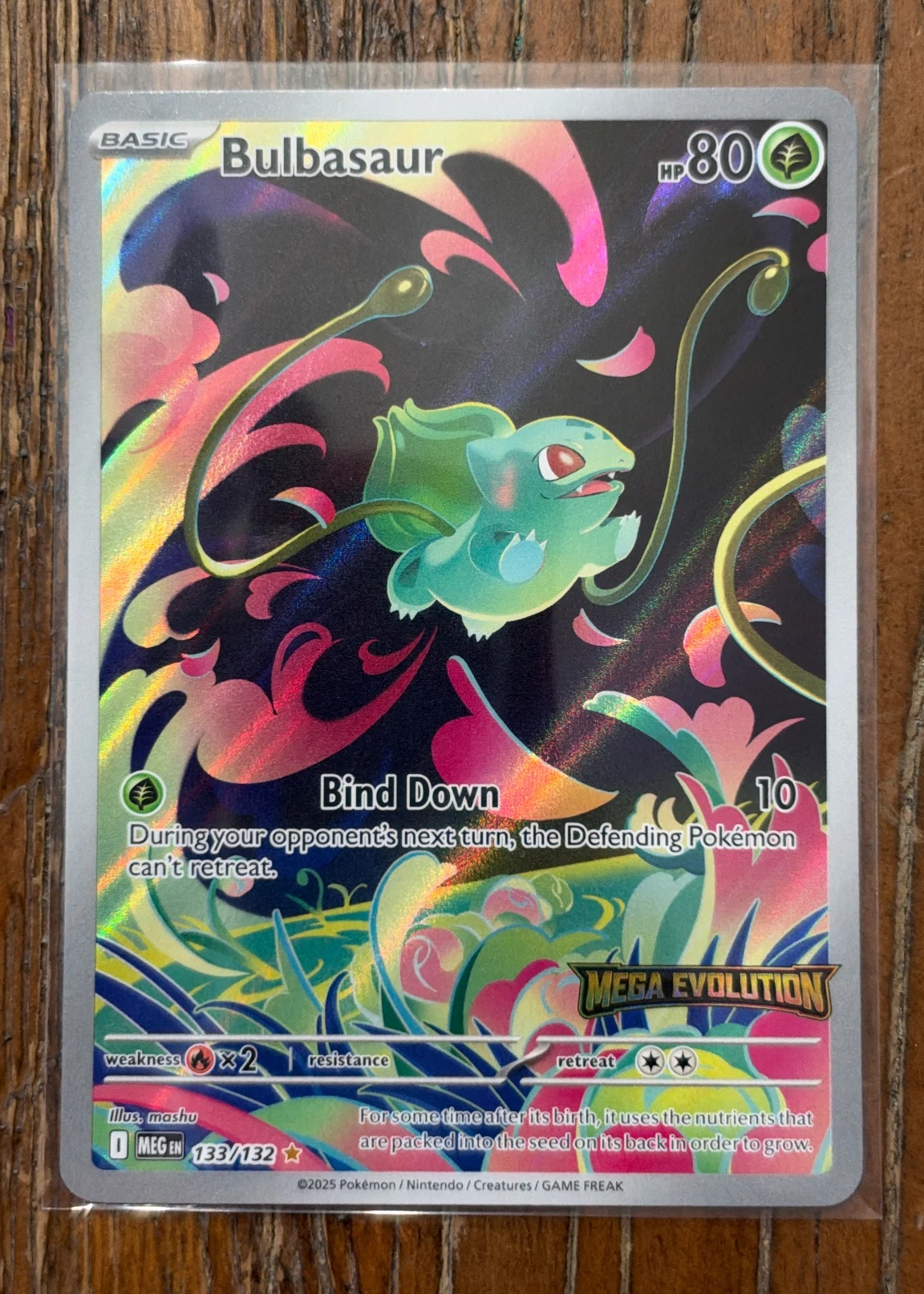Bulbasaur 133/132 Mega Evolution front card photo in GradeValue pregrading report