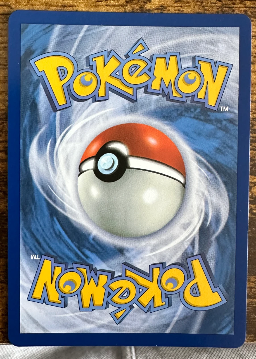 Mega Charizard X ex 125/94 Phantasmal Flames back card photo in GradeValue pregrading report
