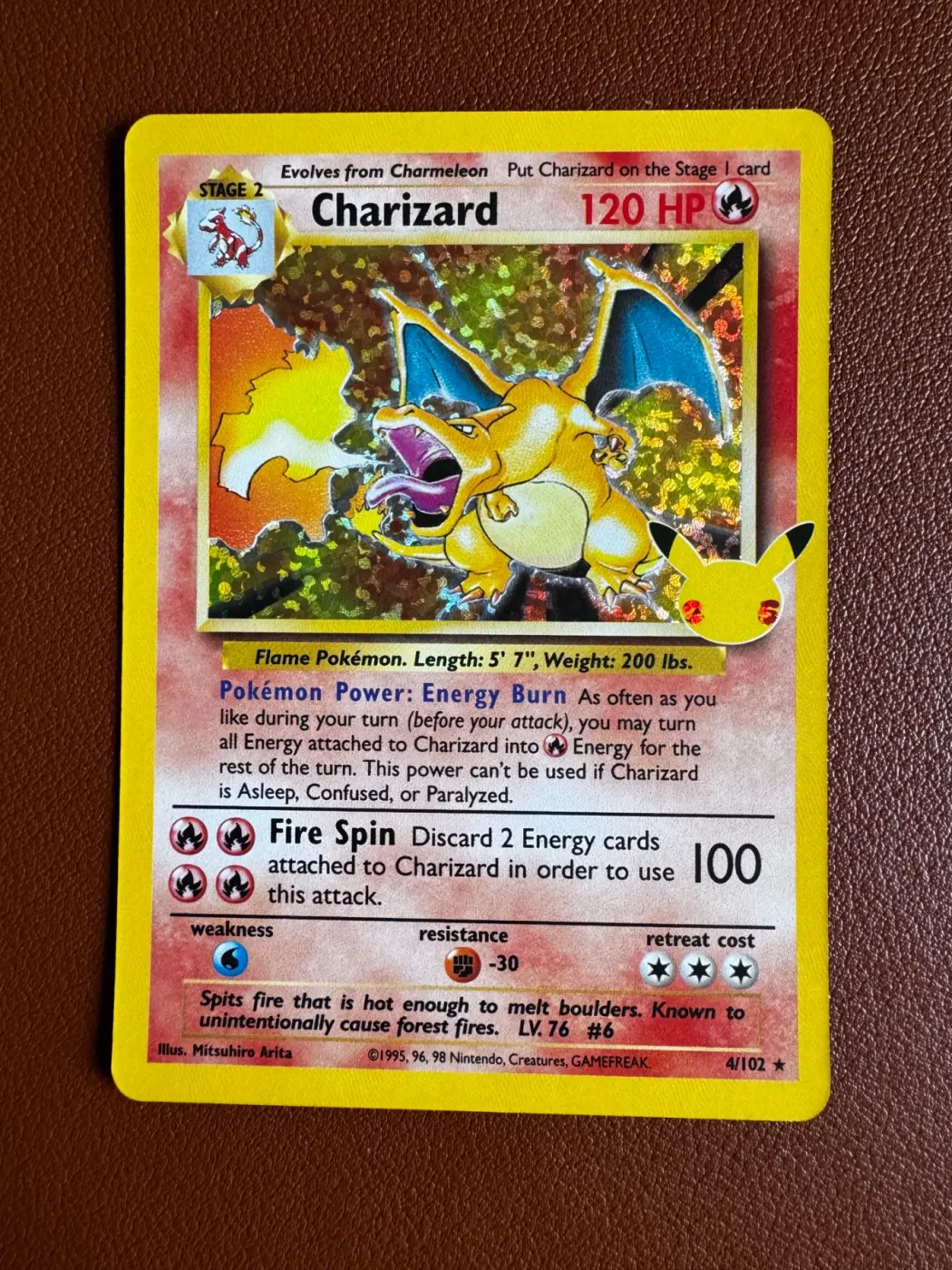 Charizard 004/102 Base Set front card photo in GradeValue pregrading report