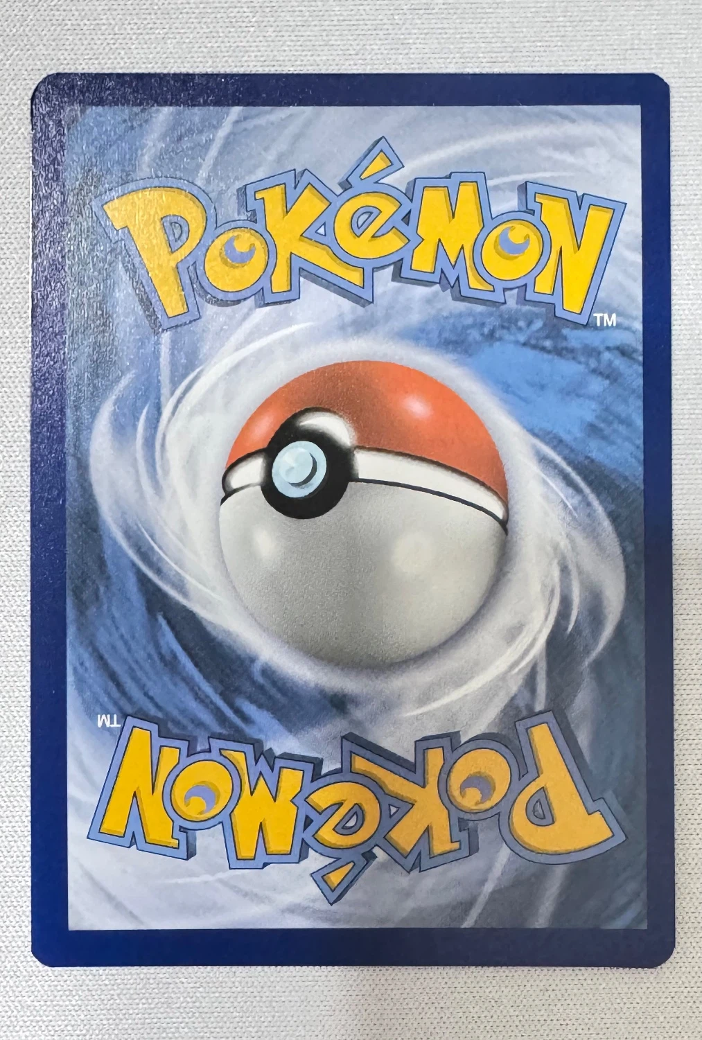 Reshiram & Charizard GX SM247/248 SM Black Star Promos back card photo in GradeValue pregrading report