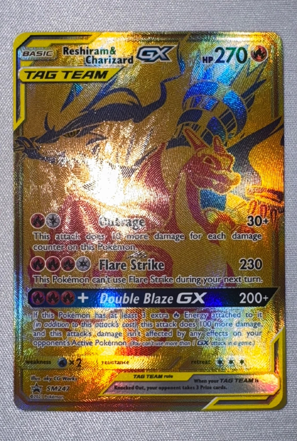 Reshiram & Charizard GX SM247/248 SM Black Star Promos front card photo in GradeValue pregrading report