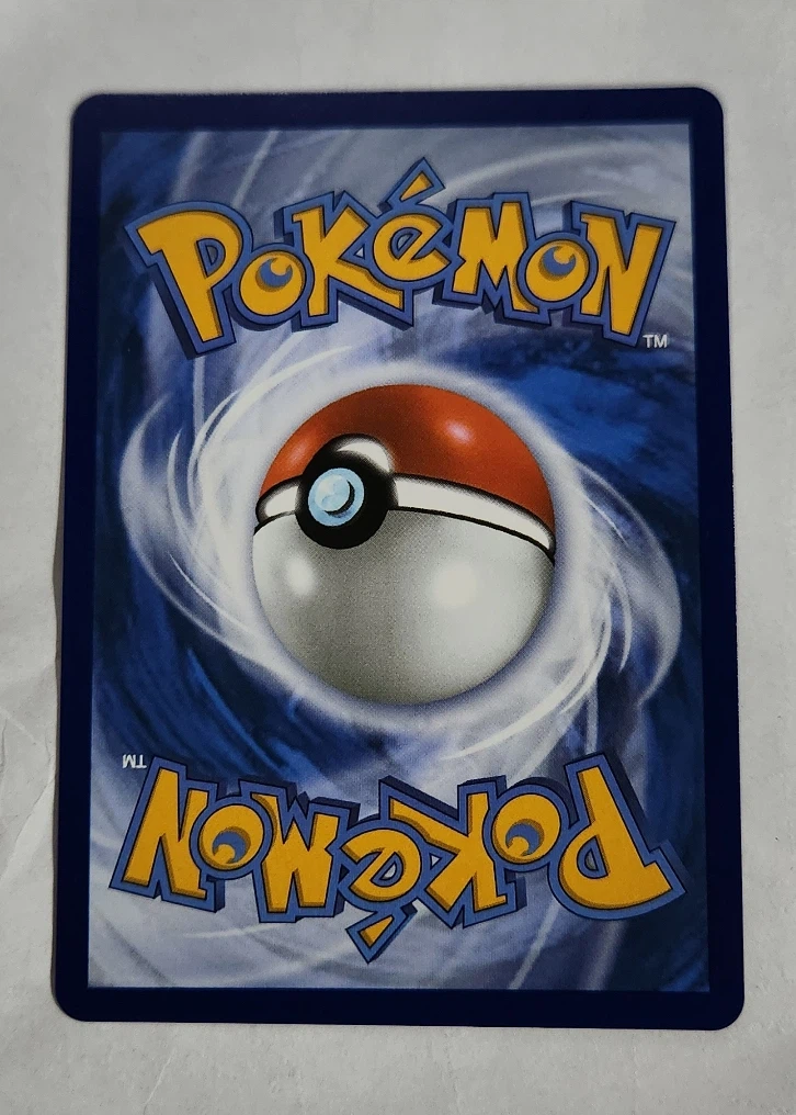 Mega Charizard X ex 125/94 Phantasmal Flames back card photo in GradeValue pregrading report