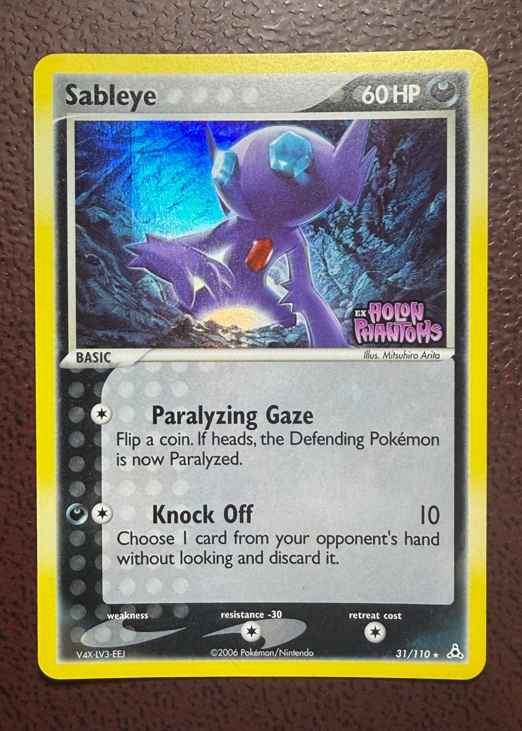Sableye 031/110 (Reverse Holo) Holon Phantoms front card photo in GradeValue pregrading report