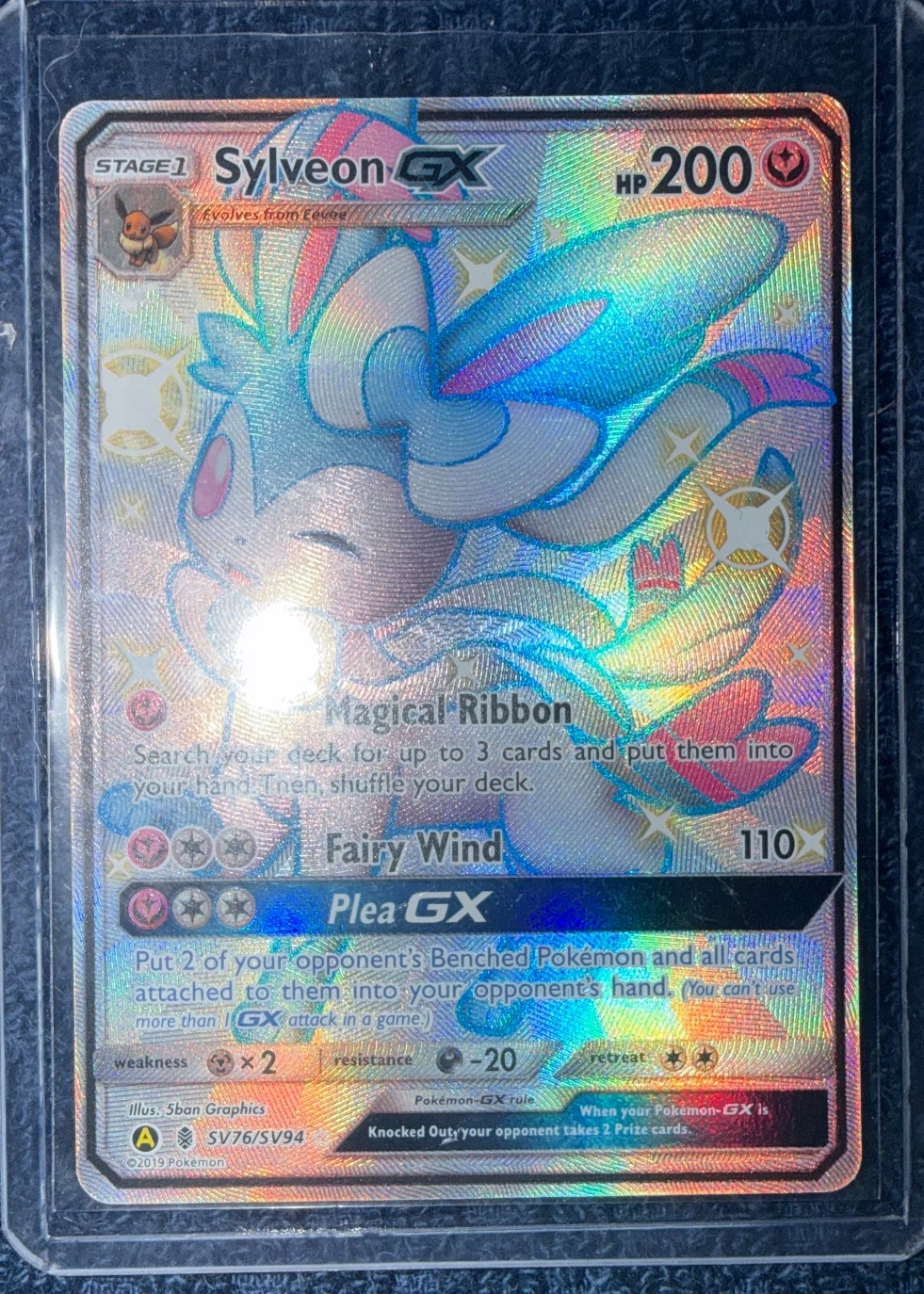 Sylveon-GX SV76/94 Hidden Fates Shiny Vault front card photo in GradeValue pregrading report