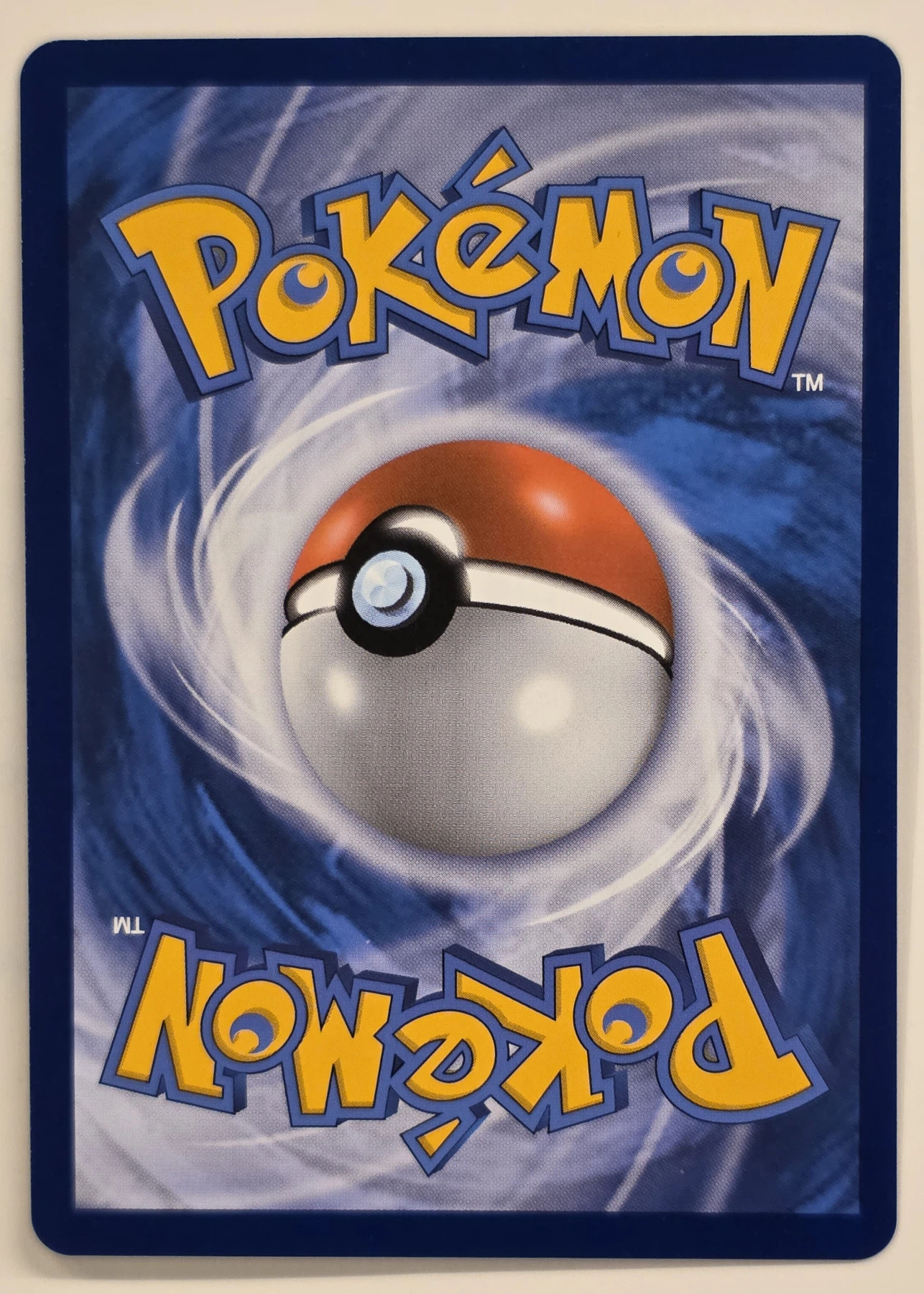 Reshiram & Charizard GX SM201/248 SM Black Star Promos back card photo in GradeValue pregrading report