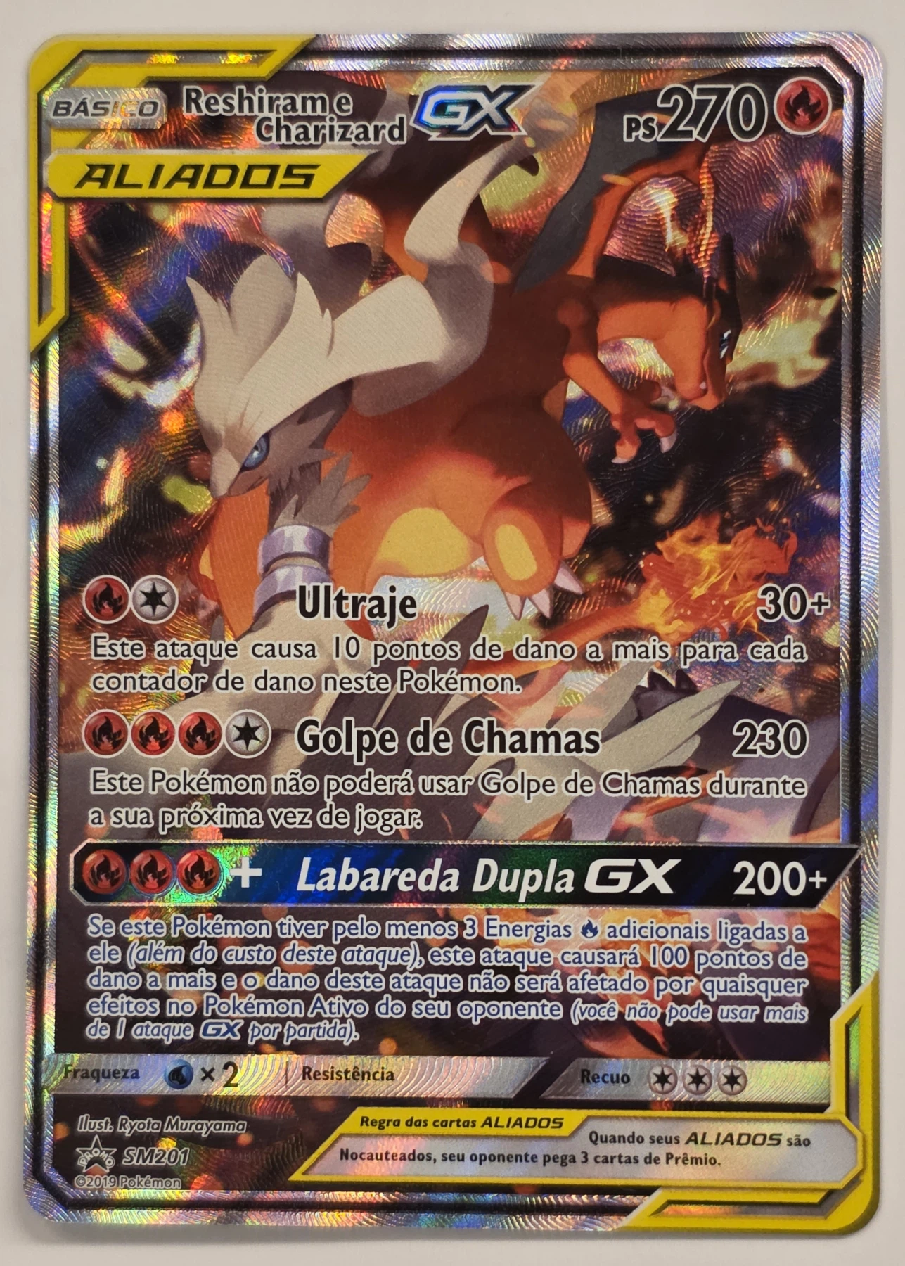 Reshiram & Charizard GX SM201/248 SM Black Star Promos front card photo in GradeValue pregrading report