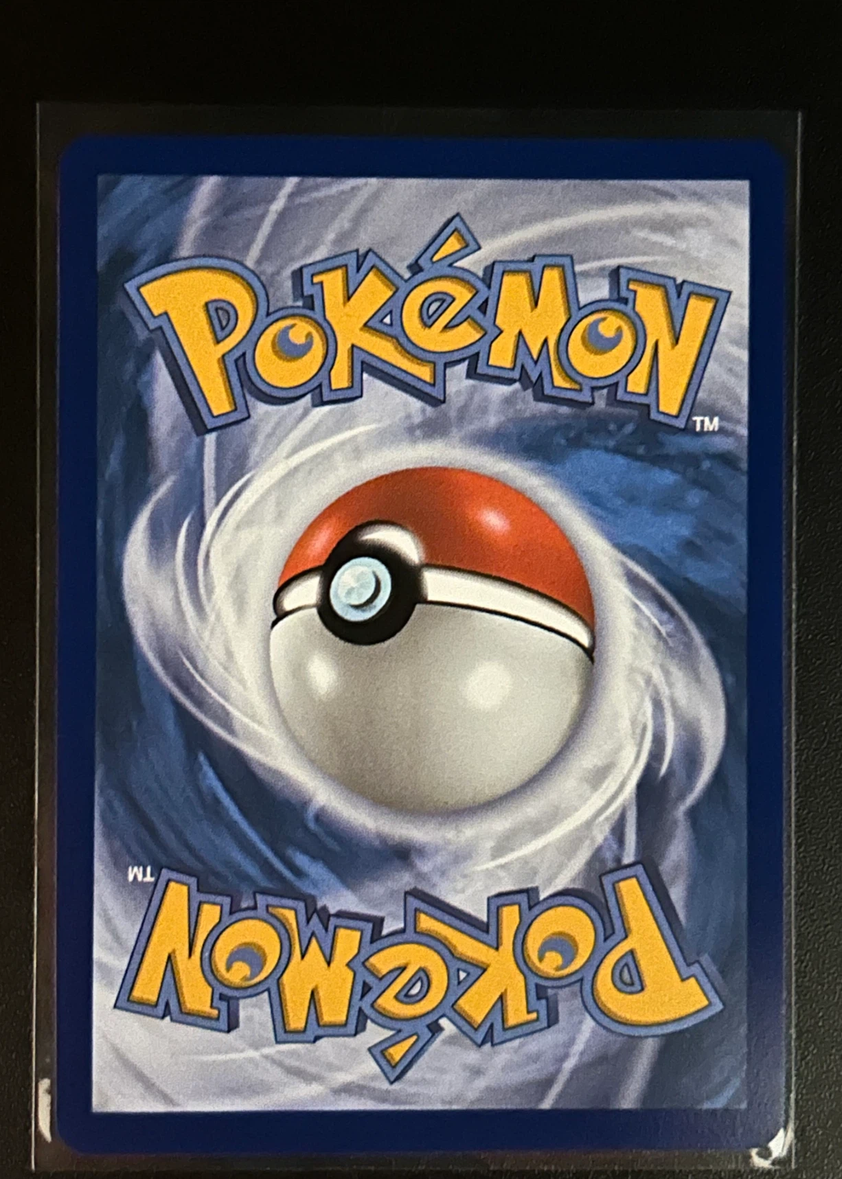 Mega Charizard X ex 130/94 Phantasmal Flames back card photo in GradeValue pregrading report