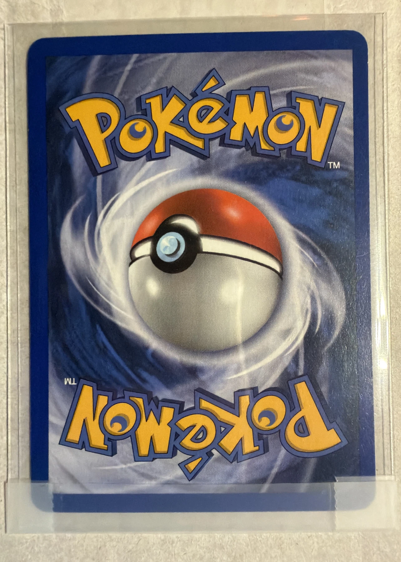 Lugia ex 105/115 Unseen Forces back card photo in GradeValue pregrading report