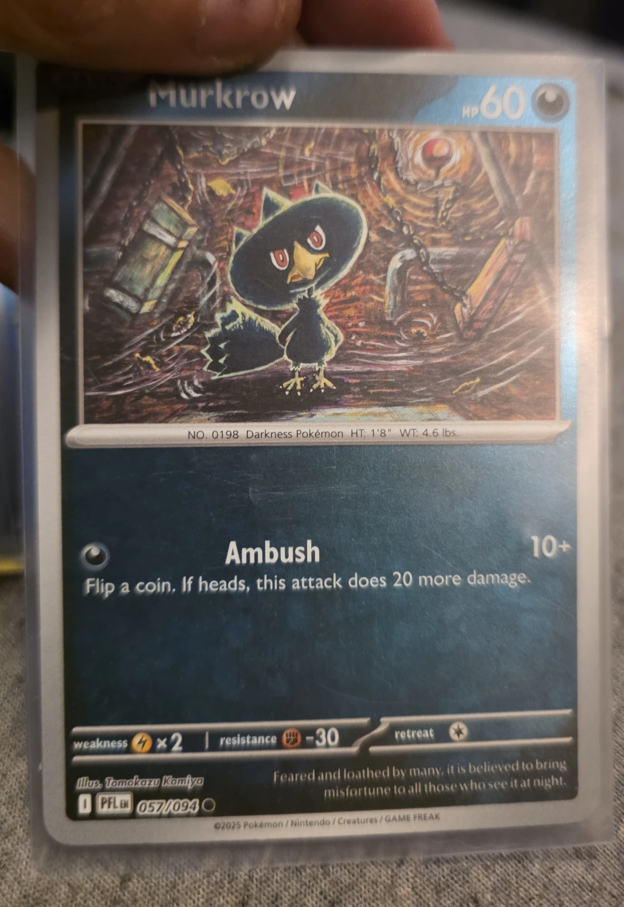 Murkrow 057/94 Phantasmal Flames front card photo in GradeValue pregrading report