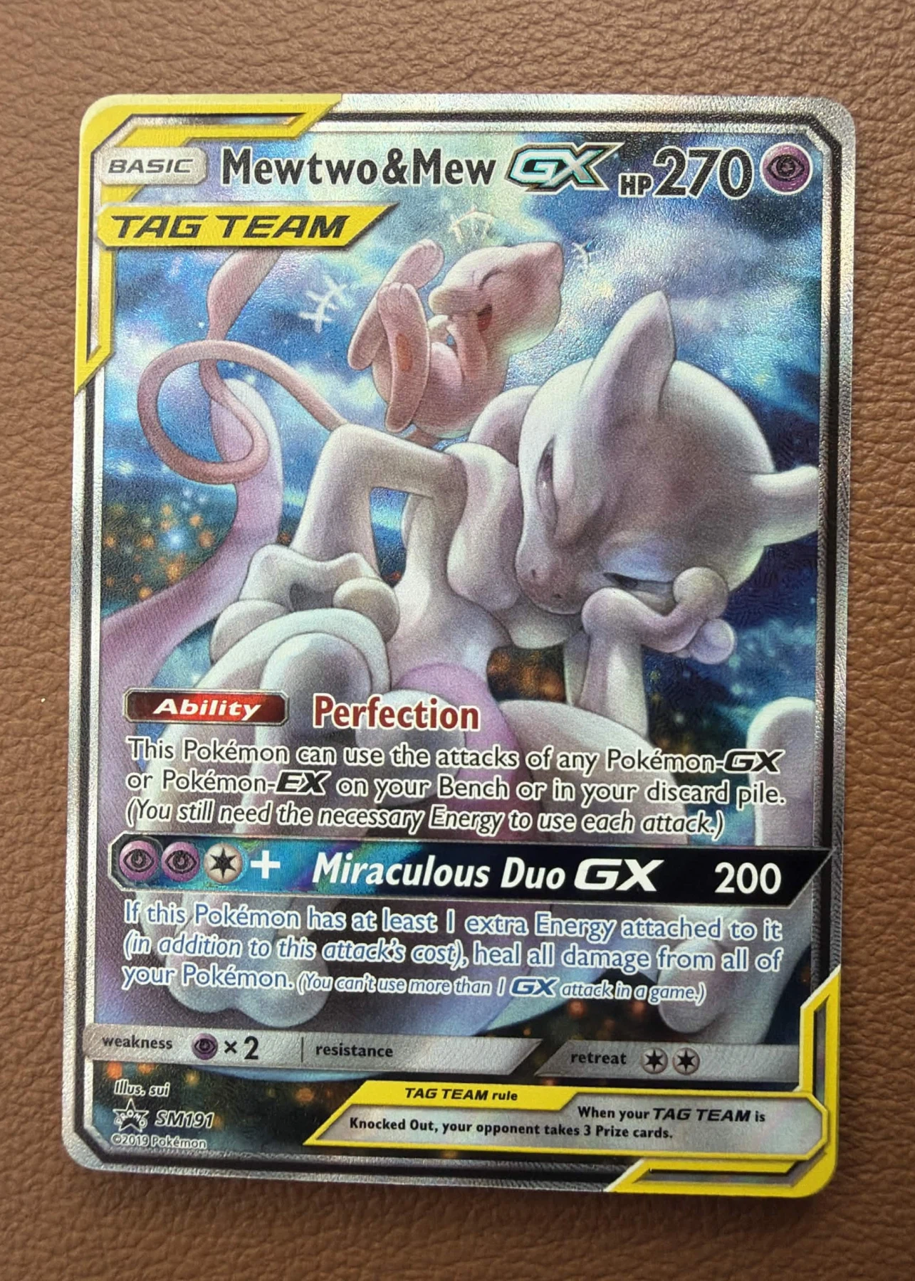 Mewtwo & Mew GX SM191/248 SM Black Star Promos front card photo in GradeValue pregrading report