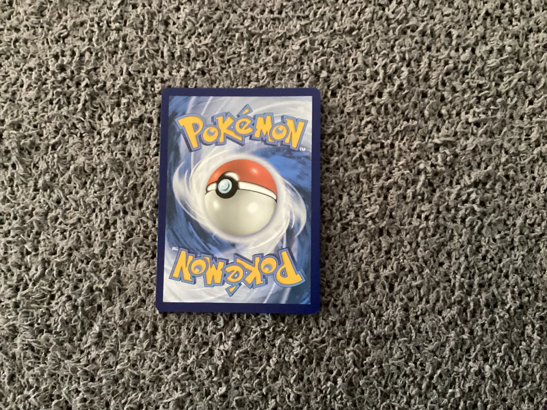 Charizard TG03/196 Lost Origin back card photo in GradeValue pregrading report