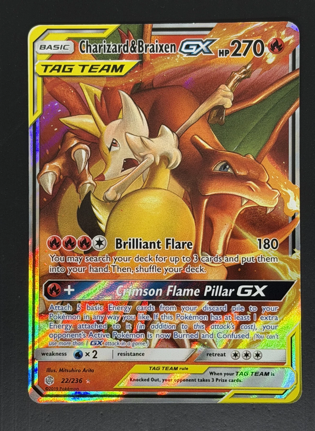 Charizard & Braixen GX 022/236 Cosmic Eclipse front card photo in GradeValue pregrading report