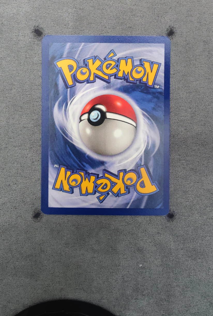 Moltres 012/62 (First Edition Stamp) Fossil back card photo in GradeValue pregrading report