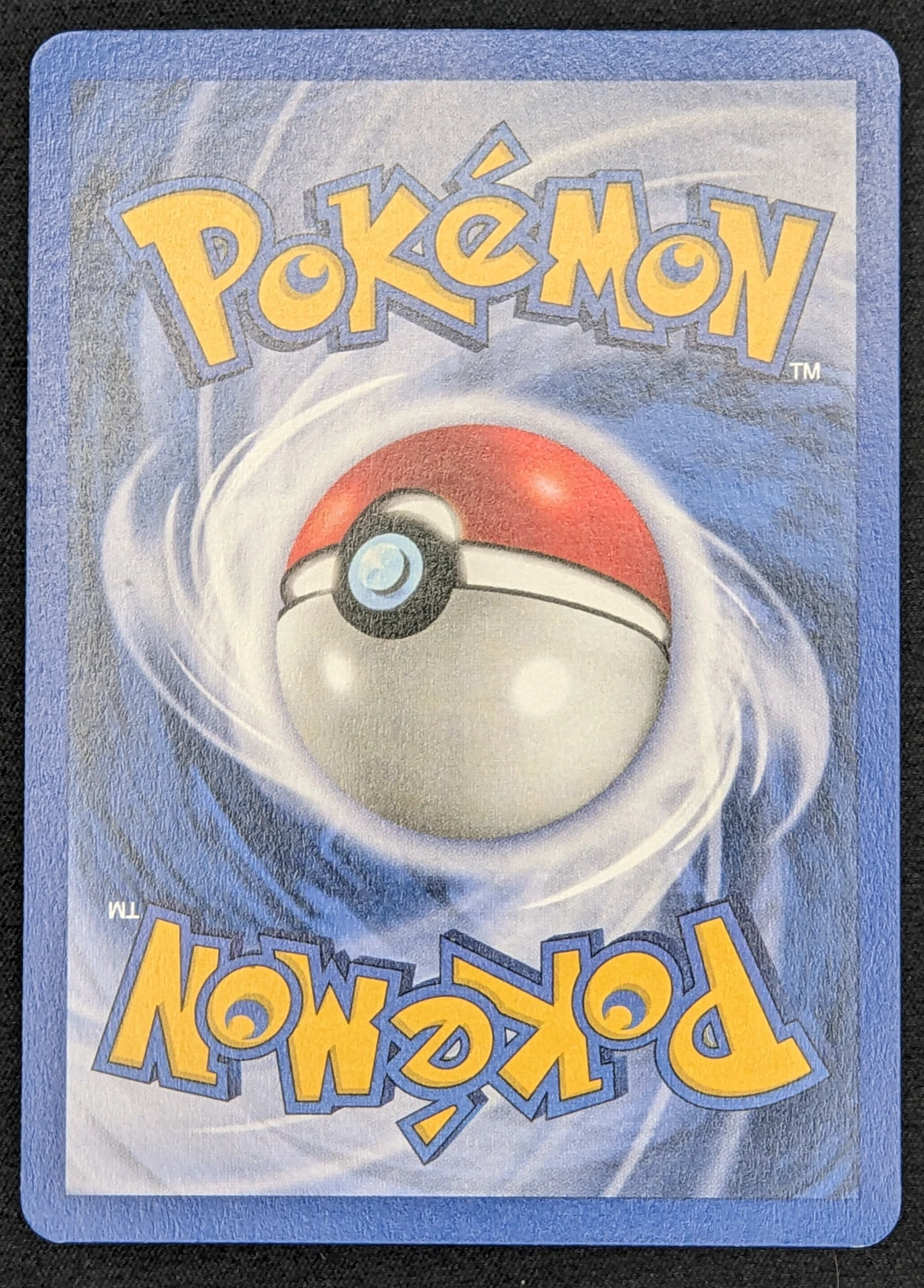 Dark Charizard 021/82 · First Edition Stamp Team Rocket back card photo in GradeValue pregrading report