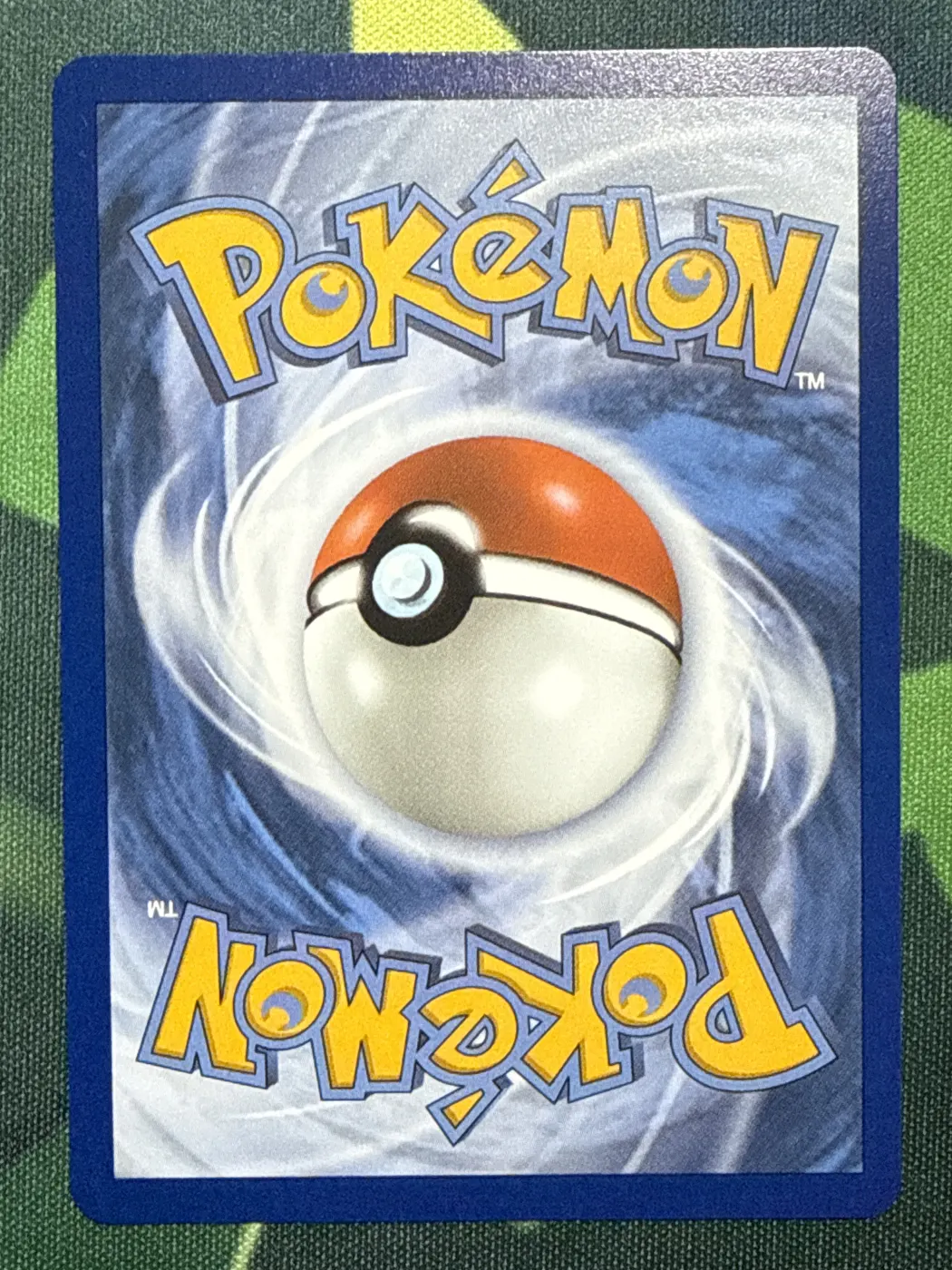 Rowlet 090/88 Perfect Order back card photo in GradeValue pregrading report
