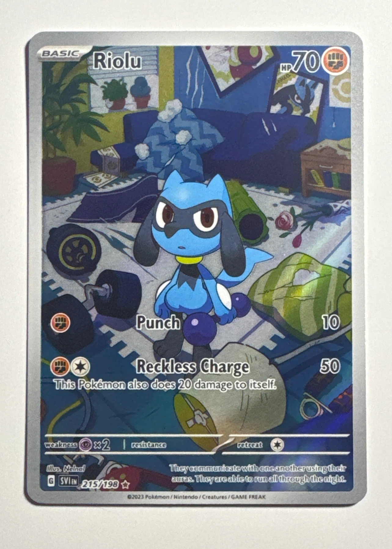 Riolu 215/198 Scarlet & Violet front card photo in GradeValue pregrading report