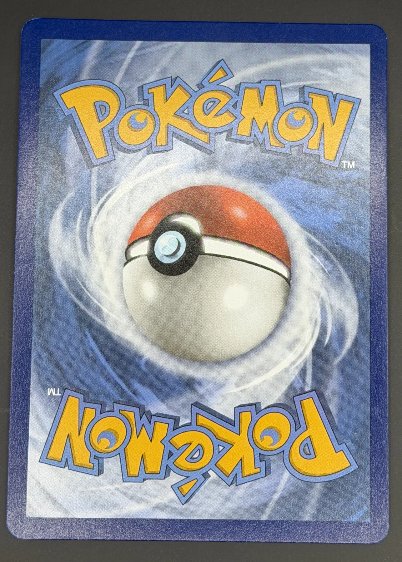 Umbreon VMAX 215/203 Evolving Skies back card photo in GradeValue pregrading report