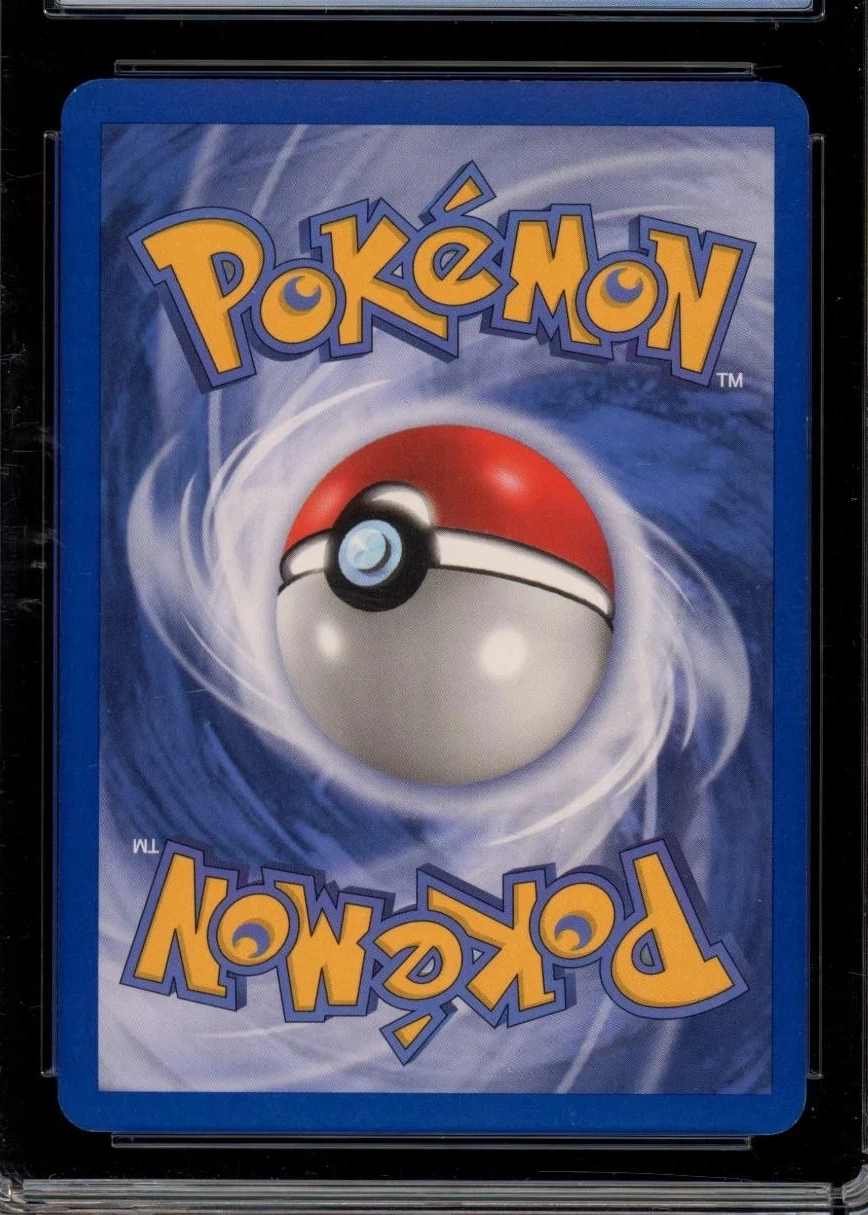 Dark Dragonite 015/109 Team Rocket Returns back card photo in GradeValue pregrading report
