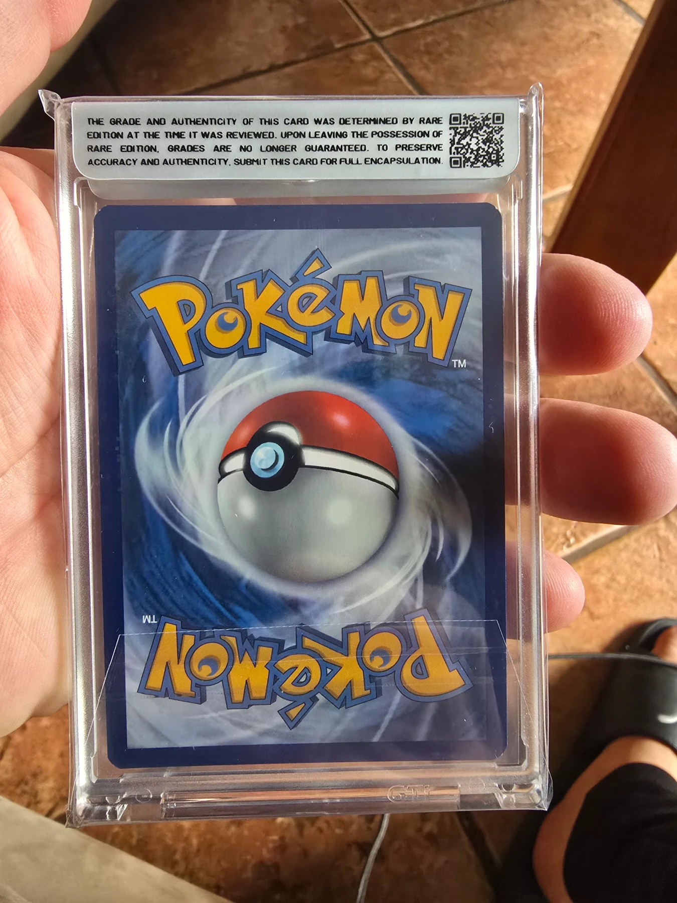 Gengar TG06/196 Lost Origin back card photo in GradeValue pregrading report