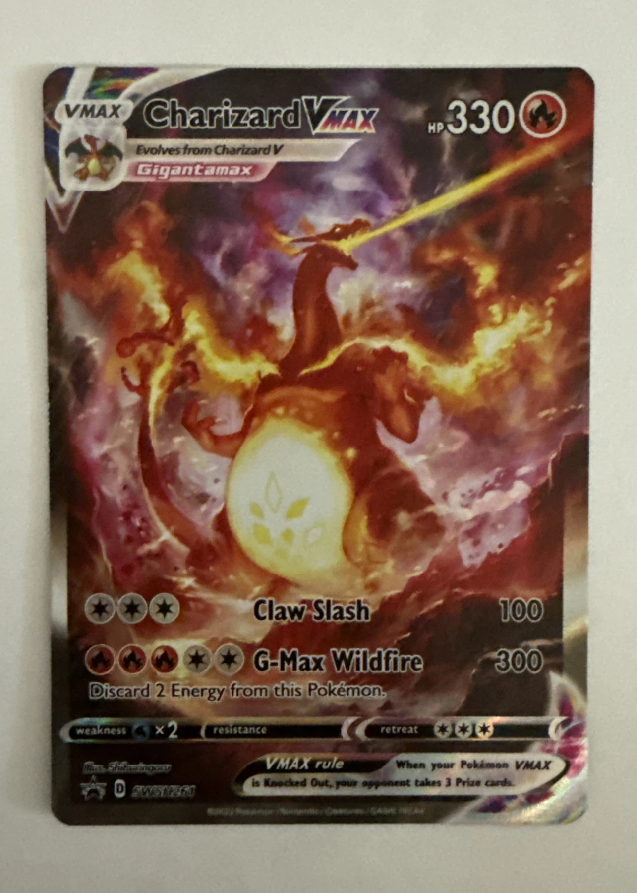 Charizard VMAX SWSH261/307 SWSH Black Star Promos front card photo in GradeValue pregrading report