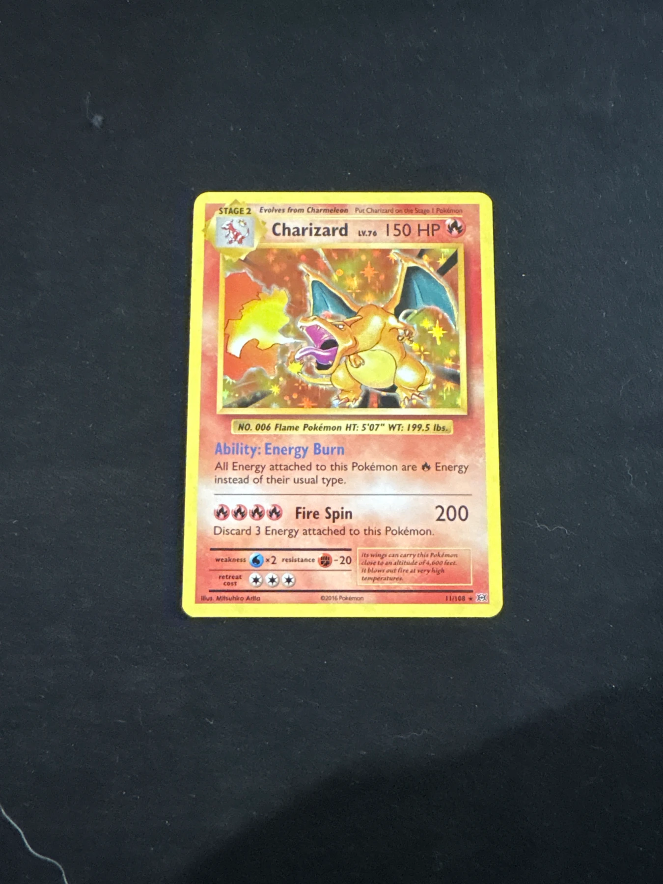 Charizard 011/108 Evolutions front card photo in GradeValue pregrading report