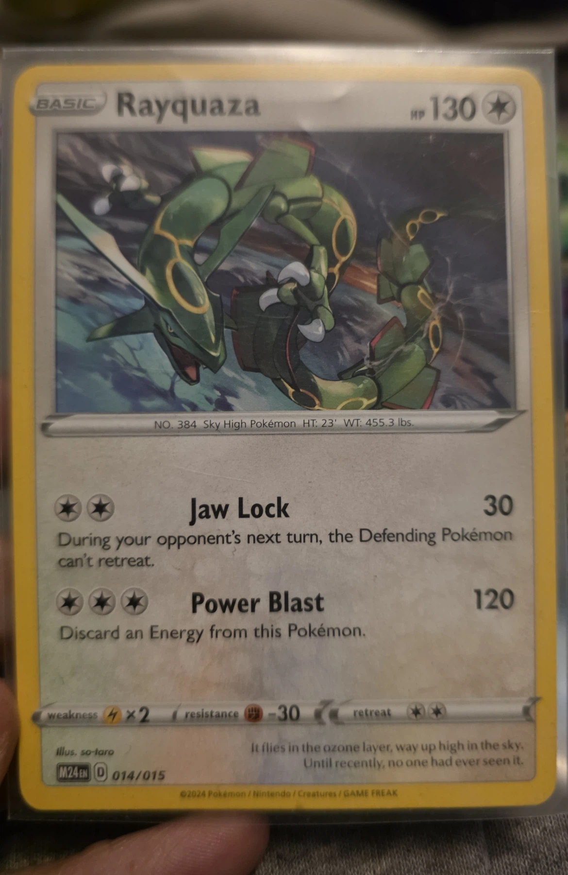 Rayquaza 014/15 McDonald's Collection 2024 front card photo in GradeValue pregrading report
