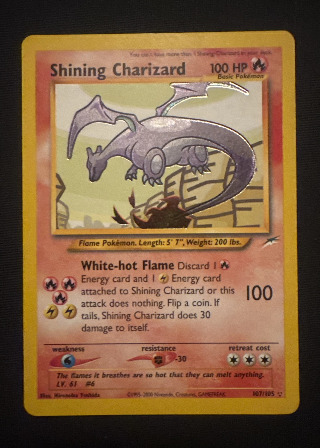 Shining Charizard 107/105 Neo Destiny front card photo in GradeValue pregrading report