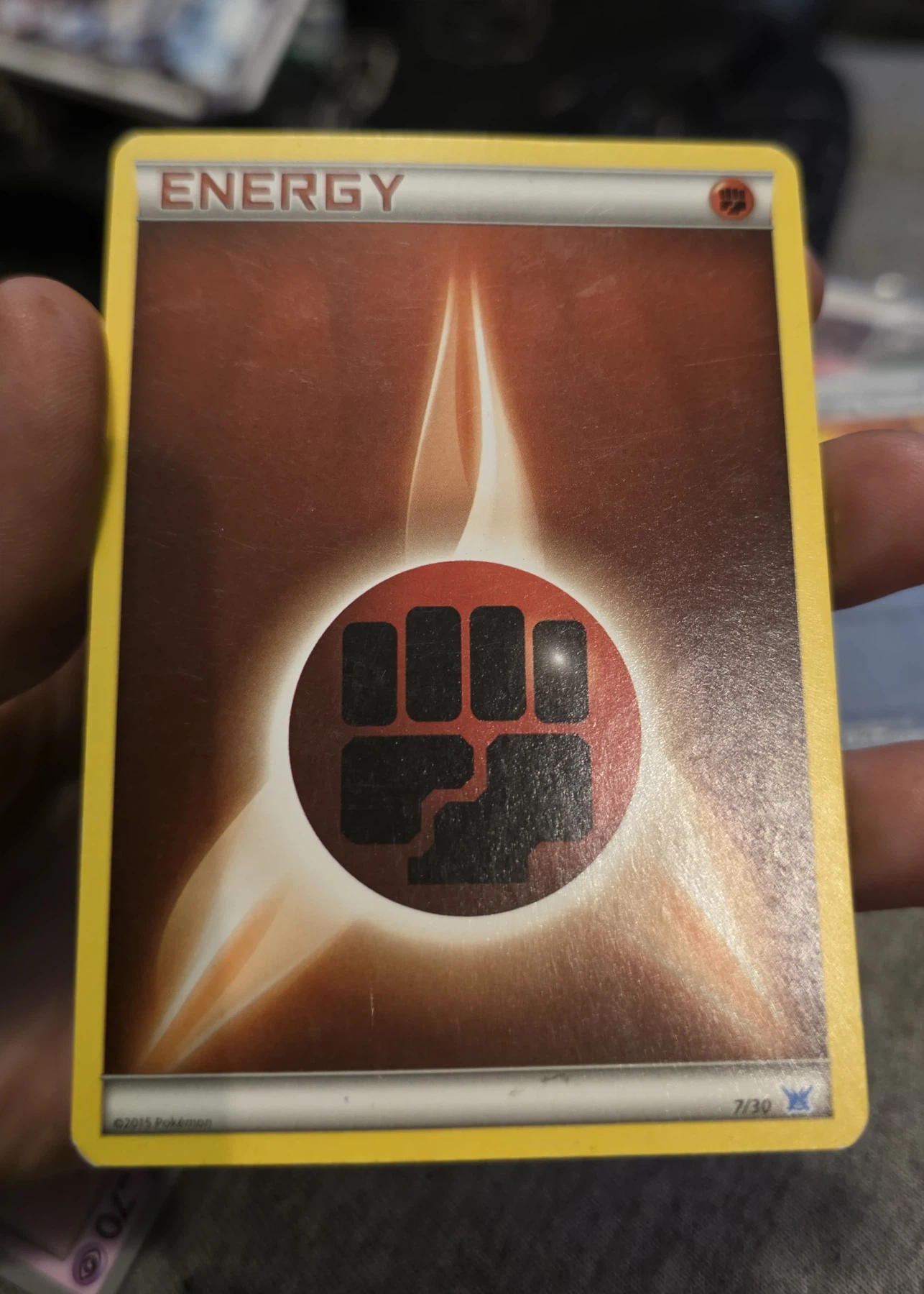 Fighting Energy 137/146 XY front card photo in GradeValue pregrading report